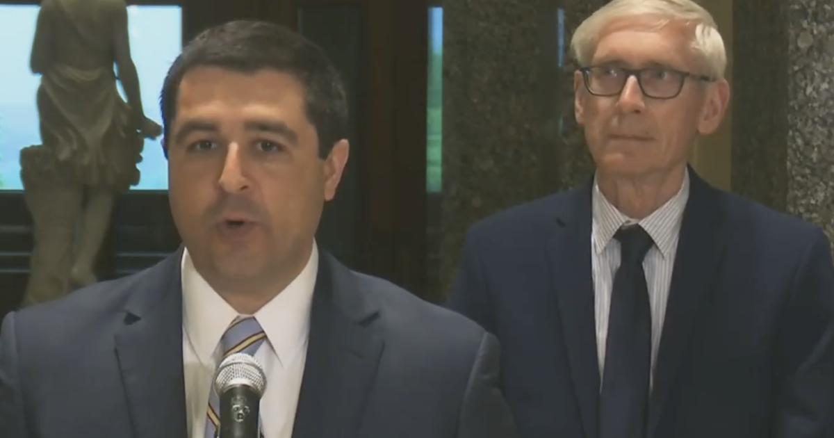 Josh Kaul and Tony Evers