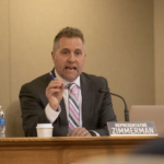 Rep. Shannon Zimmerman speaking at desk