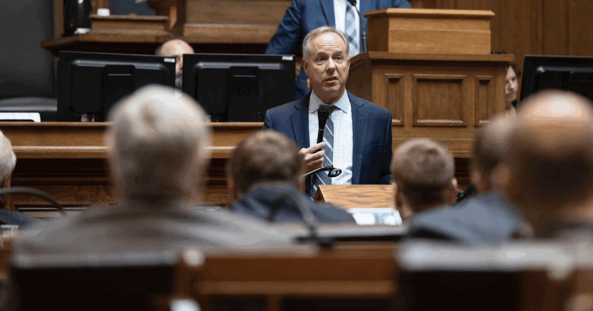 wisconsin republican rep. robin vos speaking into a microphone