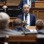 wisconsin republican rep. robin vos speaking into a microphone