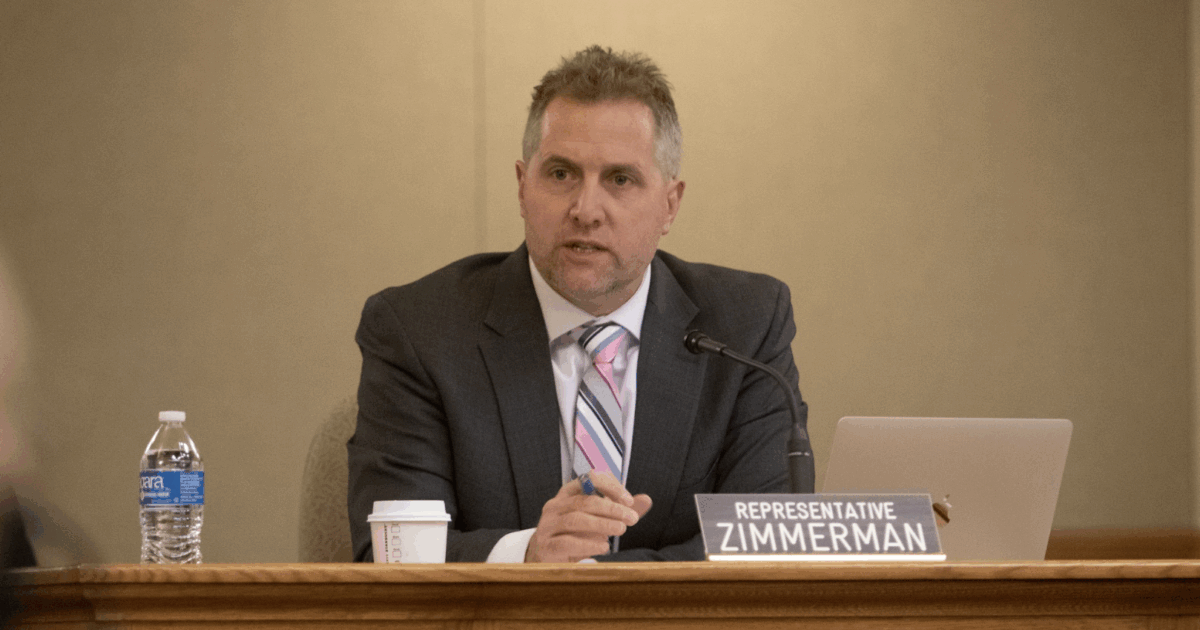 wisconsin republican rep. shannon zimmerman speaking into a microphone
