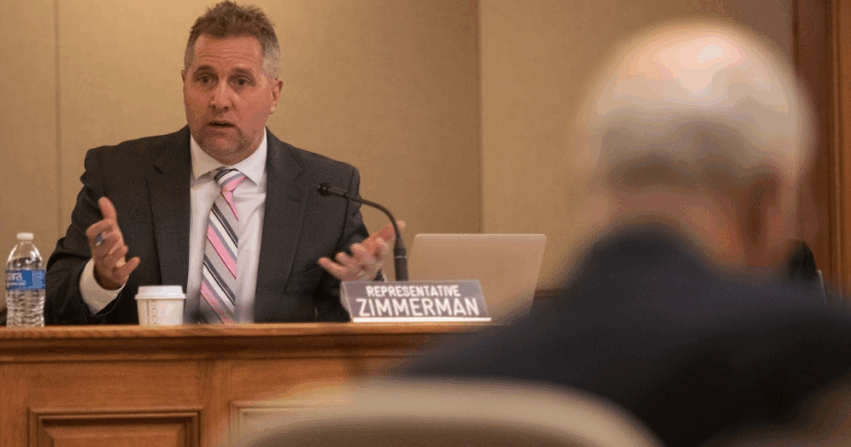 wisconsin republican rep. shannon zimmerman speaking into a microphone