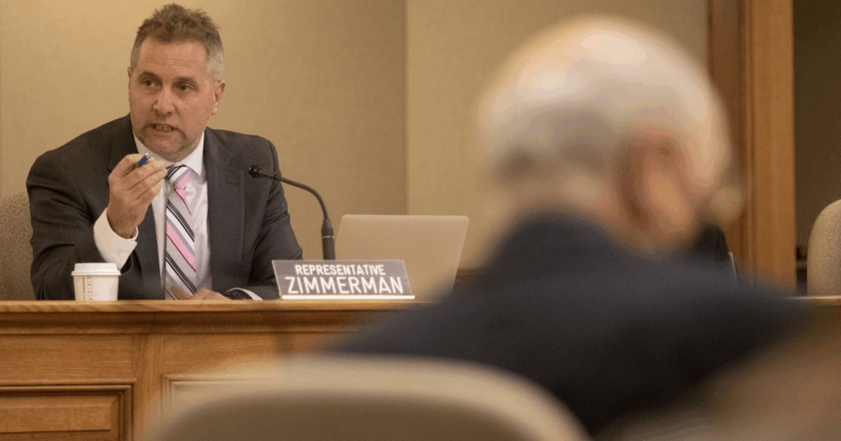 wisconsin republican rep. shannon zimmerman speaking into a microphone
