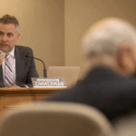 wisconsin republican rep. shannon zimmerman speaking into a microphone