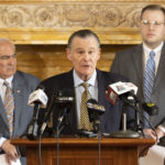 Wisconsin State Rep. Bob Donovan standing at podium
