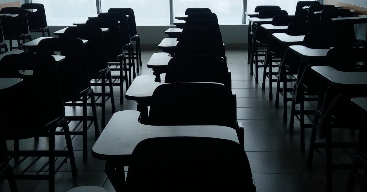 empty classroom with desks