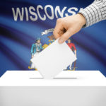 Voting concept - Ballot box with national flag on background - Wisconsin